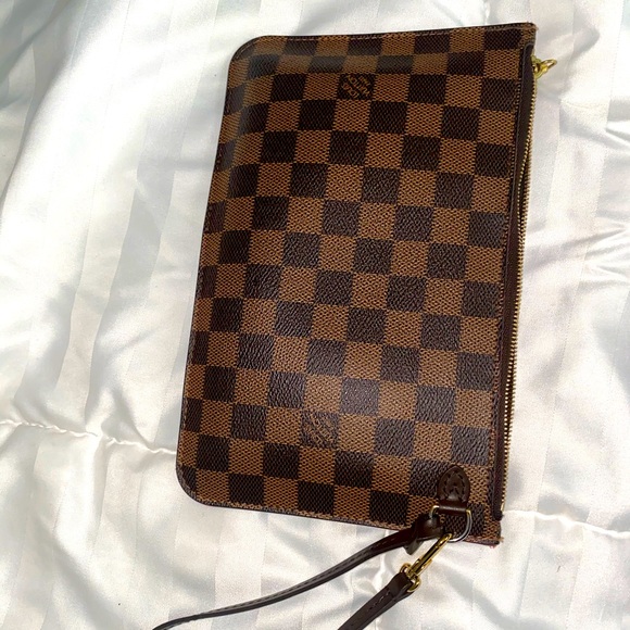 Louis Vuitton Handbags - Louis Vuitton neverfull wristlet